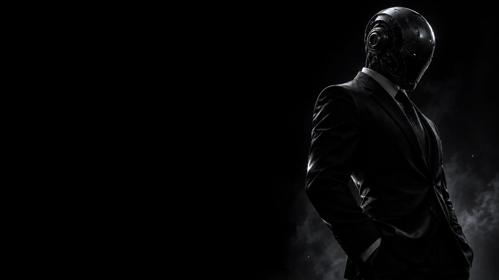 A dark metallic humanoid android in a black suit, turned slightly away in a smoky black environment